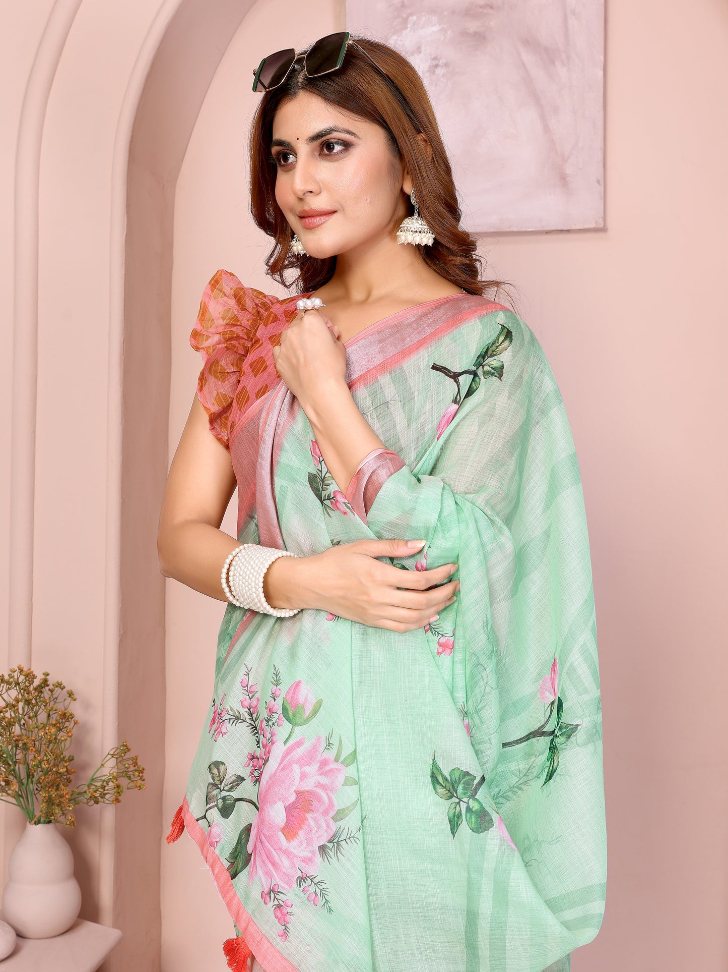 Refreshing Mint Green Linen Cotton Saree with Pink Floral Prints